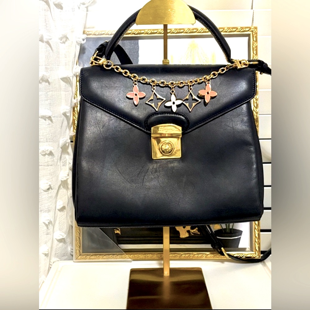 Euc Ferragamo Elegant Black Leather Handbag With Gold Accents